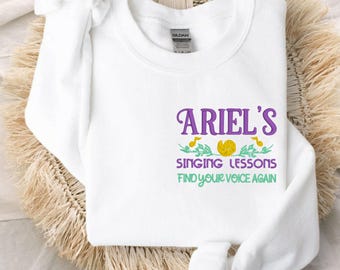 Moletom unissex com bordado "Aulas de canto da Ariel" | Magic Kingdom