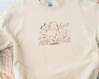 Vintage Nalle Puh på en gunga broderad unisex rund halströja | Disney World | Magic Kingdom | Höst