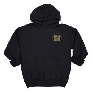 May include: Black hooded sweatshirt with a gold circle graphic on the front. The graphic says "Here you laugh it today and I think the world of you.  Let's make tomorrow a fantasy."
