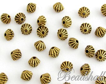 100 Metallperlen Bicones Spacer goldfarben Antik
