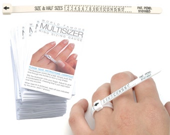 May include: A white plastic ring sizer with a black arrow and numbers from 1 to 17. The sizer is on a hand, and the text "PAT. PEND. 9101693" is printed on the sizer. A stack of white cards with the text "WORLD FAMOUS MULTISIZER RING SIZING GAUGE" is in the background.
