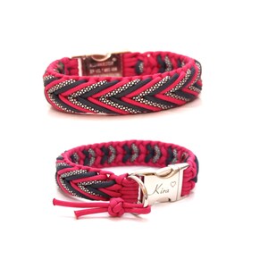 May include: A pink and black braided dog collar with a silver buckle and the name "Kira" engraved on it.