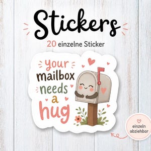 Puede incluir: Una hoja de pegatinas con la palabra "Stickers" en una fuente caprichosa. Una pegatina presenta un buzón sonriente con el texto "your mailbox needs a hug". La imagen incluye corazones y detalles florales.