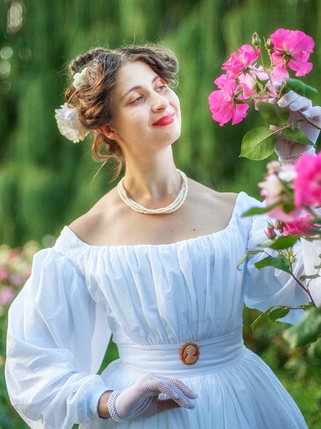 young woman dressed in blue silk ball gown with pearl necklace and white  silk gloves standing..., Stock Photo, Picture And Rights Managed Image.  Pic. TIL-AOSK37270 | agefotostock