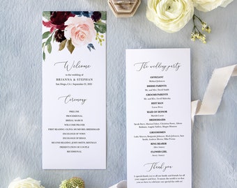 May include: Wedding ceremony program with a floral design in shades of burgundy, pink, and blue. The program includes the names of the bride and groom, Brianna and Stephan, the wedding date, September 21, 2021, and the ceremony order. The wedding party is listed on the right side of the program.
