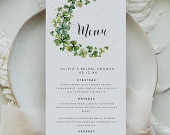May include: A green shamrock-themed menu for a bridal shower. The menu lists starters, entrees, and dessert options. The text reads "Olivia's Bridal Shower 03.12.XX".
