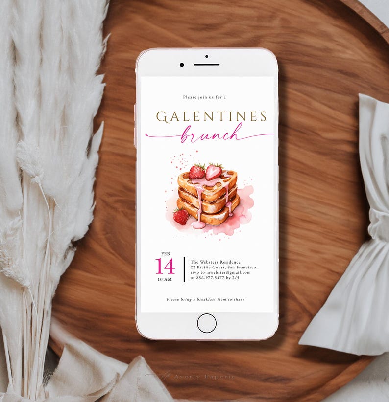 May include: A digital invitation for a Galentine's brunch on February 14th at 10 AM. The invitation features a watercolor illustration of a stack of waffles with strawberries and pink icing. The text reads "Please join us for a Galentine's brunch" and includes the date, time, location, and contact information. It also requests guests to bring a breakfast item to share.