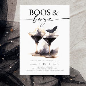 May include: A Halloween party invitation with a black and white illustration of two martini glasses with smoke and a bat. The text reads "BOOS & booze" and includes the date, time, and location of the party.