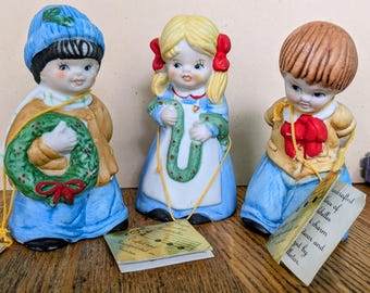 Set of 3 Bisque Porcelain Christmas Holiday Children House of Lloyd 1981 Holly Presents Garland 4 1/2" Jinglebells Bells Handpainted Taiwan