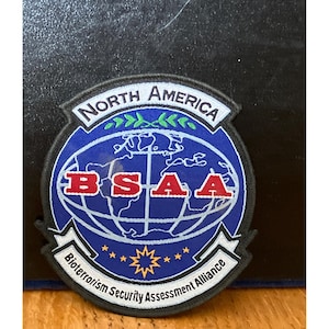 Parche de la Alianza de Evaluación de la Seguridad contra el Bioterrorismo de América del Norte (BSAA)