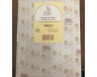 Figura "Preciosos momentos: Nada puede apagar el espíritu de solidaridad" de Enesco