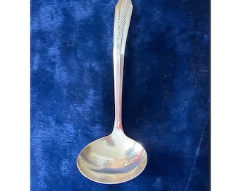 Cucharón plateado WM Rogers con mango con diseño de espigas de trigo, estilo vintage.