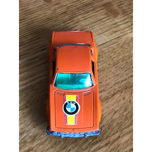 Vintage Matchbox Lesney BMW 3.0 CSL: miniatura de carro laranja fundido dos anos 1970