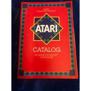 1982年製Atariビデオコンピュータシステムカタログ（ゲームプログラムカートリッジ49個収録）