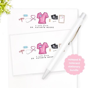 May include: A notepad and notecard stationery bundle with a pink and white design featuring a nurse's uniform, medical equipment, and the text "a note from Dr. Kathryn Moore".