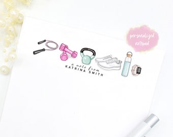 May include: A personalized notepad with a fitness theme. The notepad features a jump rope, dumbbells, a kettlebell, running shoes, a water bottle, and a fitness tracker. The text "a note from KATRINA SMITH" is printed on the notepad.