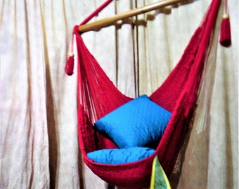 Hand-woven large hammock chair red color with cotton and wood. Hanging chair.  Christmas gift. Decor home.