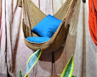 Hand-woven large hammock chair khaki color with cotton and wood. Hanging chair. Decor home.