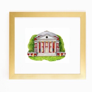 May include: A watercolor painting of a red brick building with a white dome and columns. The building is surrounded by green grass and trees. The painting is framed in a gold frame.