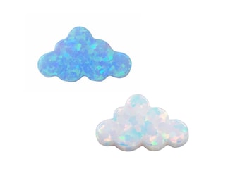 May include: Two iridescent opal cloud shaped cabochons. One is light blue and the other is white.