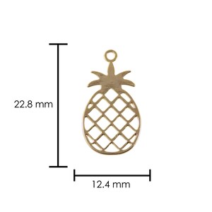 Gold pineapple charm 22.8 mm shown with size reference for scale