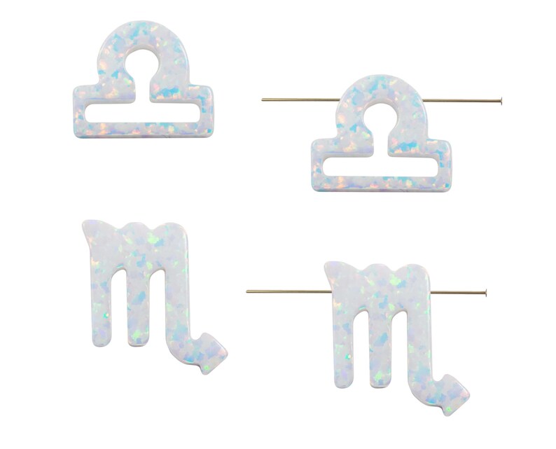Lab‑created opal zodiac pendant with top hole for astrology jewelry making.