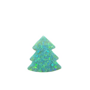 May include: A light blue iridescent opal Christmas tree charm. The charm is made of a sparkly, translucent material and has a delicate, intricate design.