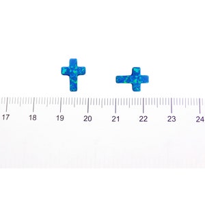 Size reference of lab‑created opal cross charm with 1mm side hole