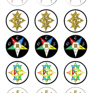 May include: Twelve round cupcake toppers featuring a variety of designs. The designs include a butterfly, a star with a compass, and a stylised letter 'S'.