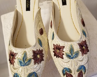 Designerskie kapcie od Syndeche Eshun