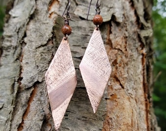 Handmade textured copper earrings.
