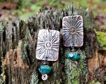 Handmade etched copper earrings.
