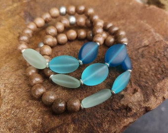 Sea glass and wood bead bracelets.