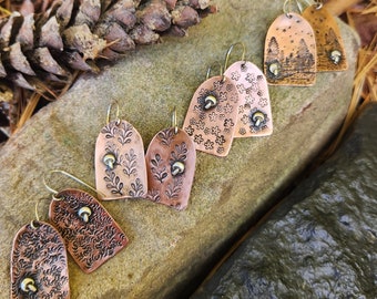 Handmade stamped copper earrings with sterling mushroom accent and .925 sterling silver ear wire.