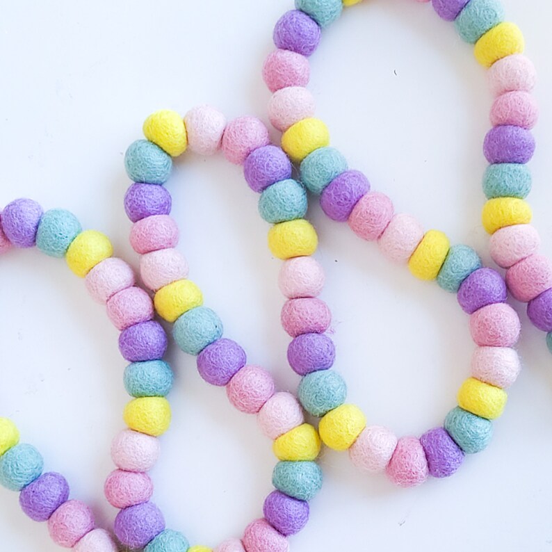 Wool felt letter garlands are an easy way to add a little color and whimsy to your birthday party, play room, or any other room in your home. Party, celebration, home decor, nursery, spring