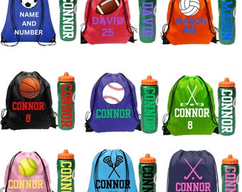 May include: A collection of nine drawstring bags and matching water bottles in various colors. Each bag features a sports graphic, a name, and a number. The water bottles are green with orange caps and display the name printed vertically in bold letters.