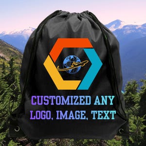 May include: A black drawstring backpack featuring a central graphic of a blue globe with an airplane silhouette inside a multicolored hexagon. Below the graphic, the text reads: CUSTOMIZED ANY LOGO, IMAGE, TEXT in a light blue and purple gradient font.