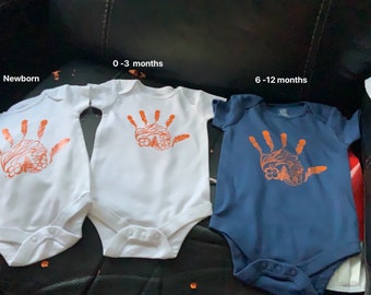 Every child matters onesie handprint