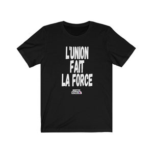 May include: Black t-shirt with white text that reads "L'UNION FAIT LA FORCE" and a small logo that reads "LA FORCE REPUBLIC".