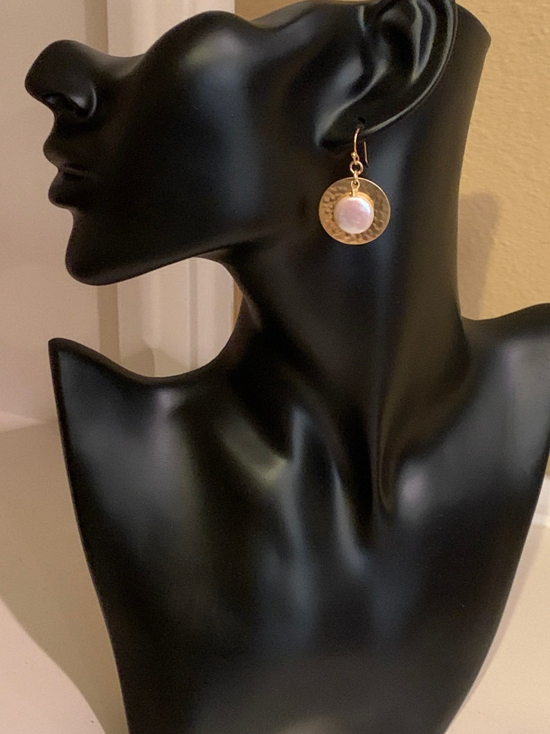 Solid hammered brass disc earrings with freshwater coin pearls.