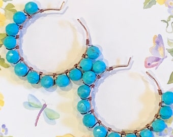 Turquoise hoop earrings.