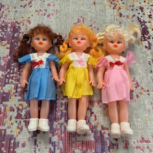 Vintage 1970s Vinyl Girl Doll: School Dress, Posable Arms