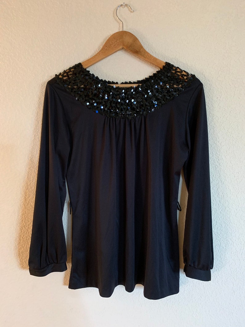 Vintage Teddi California Black blouse with Sequins trim on neck Size 10