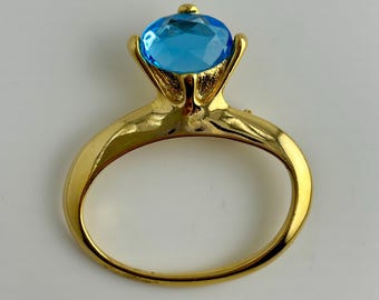 Broche vintage en forme d'anneau avec gemme bleu aqua, ton or
