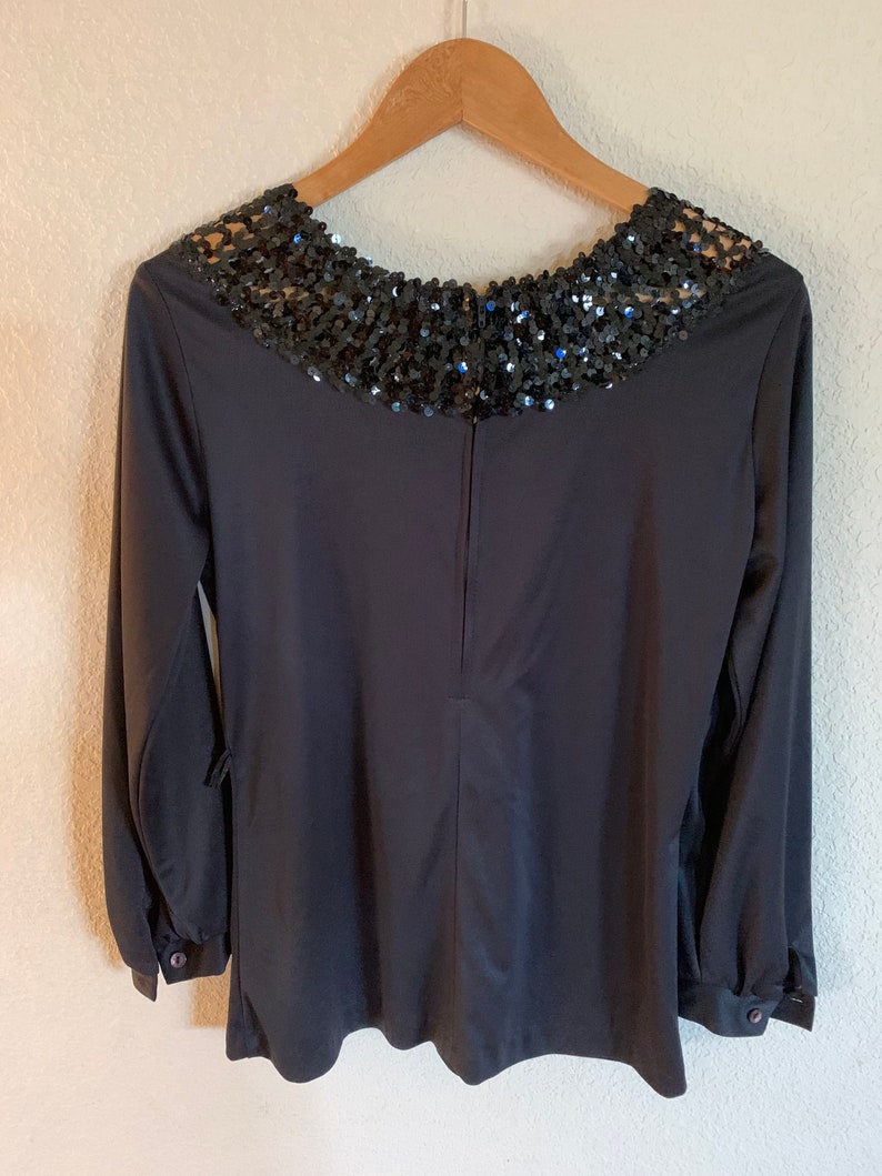 Vintage Teddi California Black blouse with Sequins trim on neck Size 10