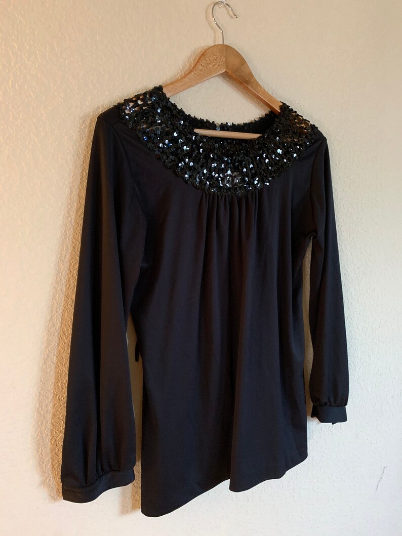 Vintage Teddi California Black blouse with Sequins trim on neck Size 10