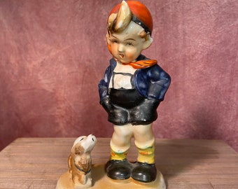 hummel boy with dog
