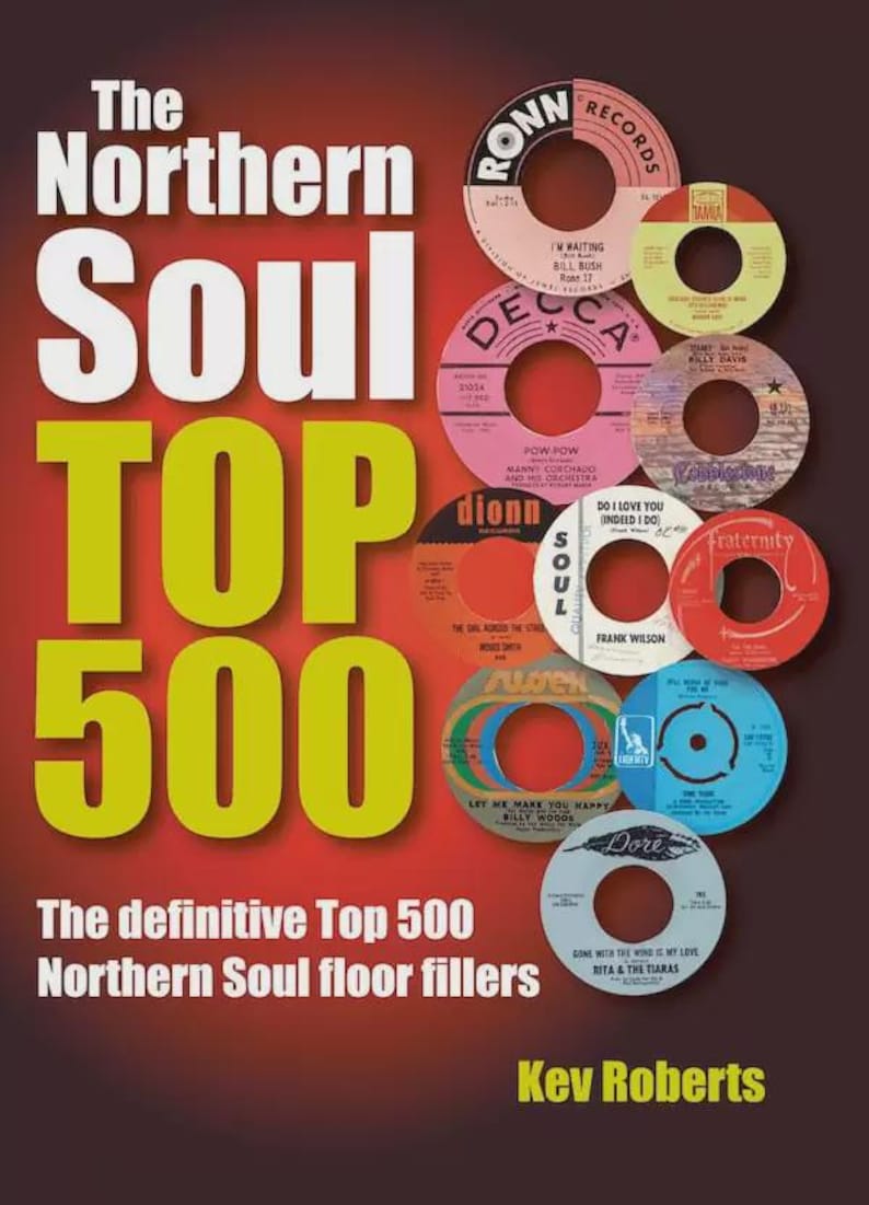 May include: A book cover with the title "The Northern Soul Top 500" in yellow letters on a red background. The book cover features a collage of vintage vinyl records with various labels and titles.