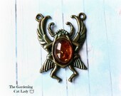 1 large scarab beetle pendant with real amber setting, scarab pendant, Egyptian scarab, focal point, ooak pendant, amber pendant, UK charms