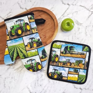 以下が含まれることがあります： 農機具、トラクターやコンバインなどの画像が描かれたパッチワークデザインの緑と黒のキルト製キッチン鍋つかみ2個セット。鍋つかみは綿製で、キルトのデザインが施されています。鍋つかみは、熱い表面から手を守るのに最適です。